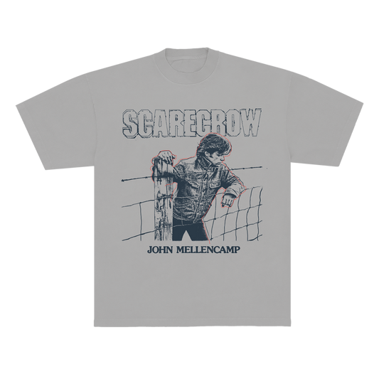 A light gray short-sleeve t-shirt featuring a distressed graphic print of John Mellencamp with the text 'SCARECROW' above and 'JOHN MELLENCAMP' below,